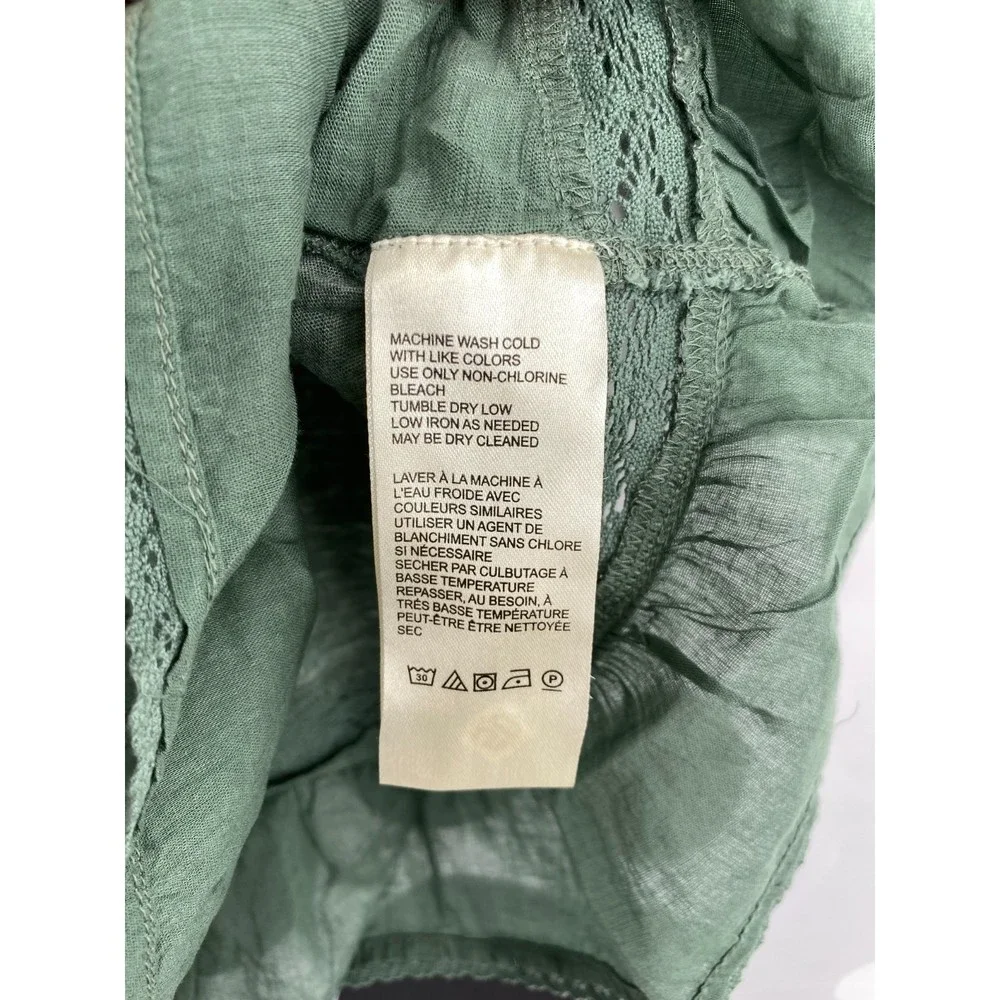 Free People NWT Fall in Love Lace Inset Ruffle Bottom Tee Washed Army Medium New - Picture 6 of 10